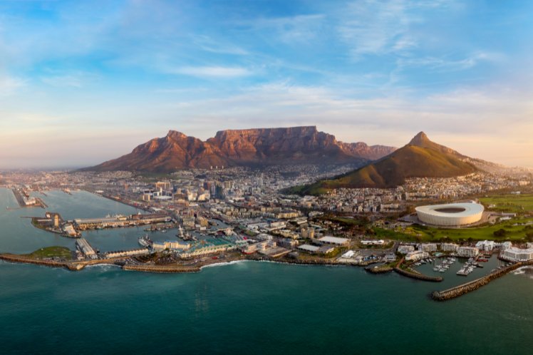 Panoramic view of Cape Town with Table Mountain in the background and the stadium by the waterfront.