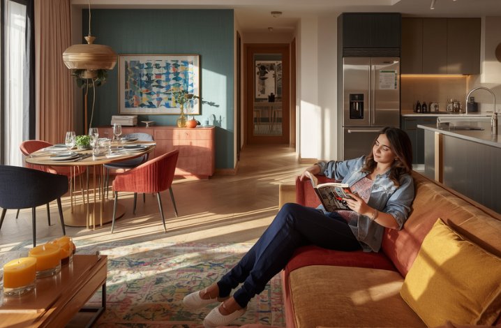 Employee settling into corporate housing with comfortable temporary accommodation during relocation.