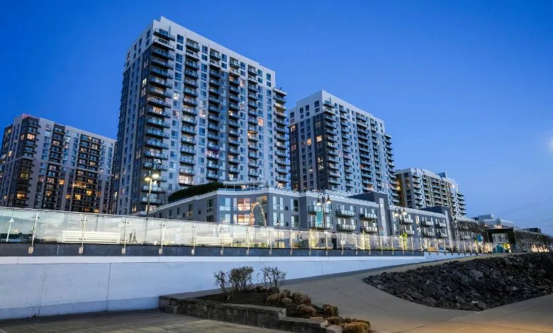 Modern serviced apartment buildings with balconies.