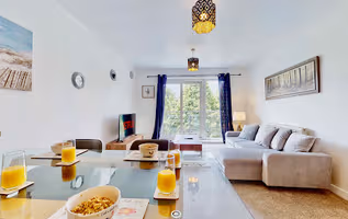 Stylish Riverside Apartment with Parking