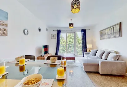Stylish Riverside Apartment with Parking