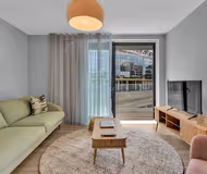 Living area at Olympic Way Apartment in Wembley Park by MySquare