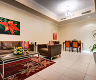 Cosy living area in Dubailand Serviced Apartments, Dubai Land