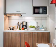 Fully equipped kitchen at The Bercy Village Serviced Apartment, Bastille