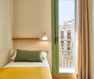 Single bed bedroom at Sants-Eixample 3 bedroom serviced apartment