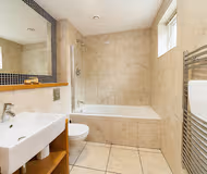 Luxury bathroom at Central Durham Riverfront Apartment