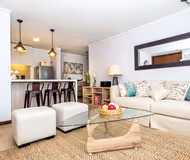 Living area at Vespucio Sur