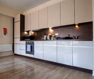 Fully equipped kitchen at Alencon Link Apartments