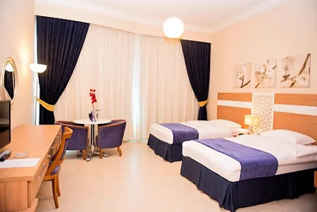Luxury bedroom at Khalid Bin Al Waleed Street Serviced Apartments