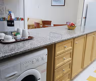 Fully equipped kitchen at Muroor Street Serviced Apartment, Al Muroor