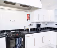 Fully equipped kitchen at Spacious &amp; Modern 1 BR - ZONE 1 - Netflix