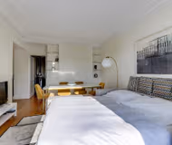A BALCONY THAT OVERLOOKS ESPLANADE DES INVALIDES-A STUNNING EIFFEL HOME