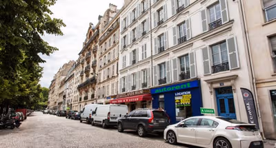 A BALCONY THAT OVERLOOKS ESPLANADE DES INVALIDES-A STUNNING EIFFEL HOME