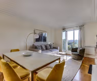A BALCONY THAT OVERLOOKS ESPLANADE DES INVALIDES-A STUNNING EIFFEL HOME