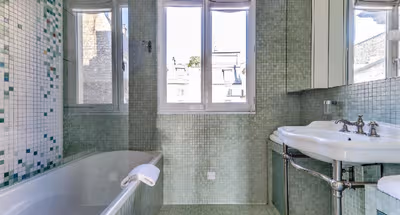 A BALCONY THAT OVERLOOKS ESPLANADE DES INVALIDES-A STUNNING EIFFEL HOME