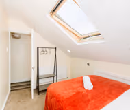 Bedroom at Station Apartment