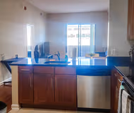 Fully equipped kitchen in 1 bed at Furnished Cozy Unit in Mariner Bay