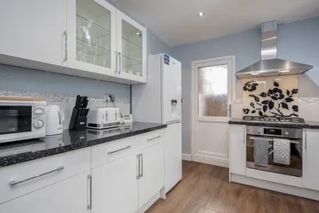 Fully equipped kitchen at Cowridge House - 6 Bedroom
