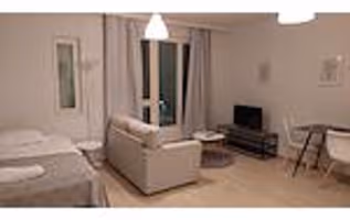 Studio Center Service Apartment