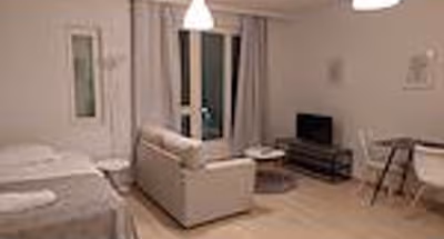 Studio Center Service Apartment