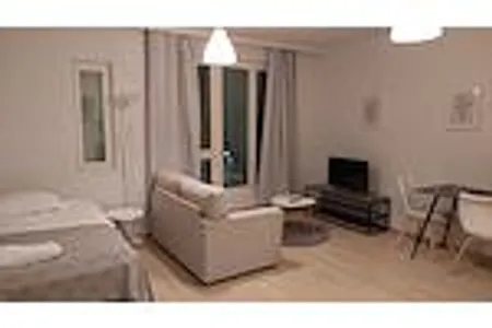 Studio Center Service Apartment