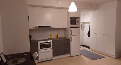 Studio Center Service Apartment