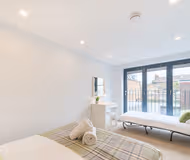 Open plan bedroom at Central Apartments