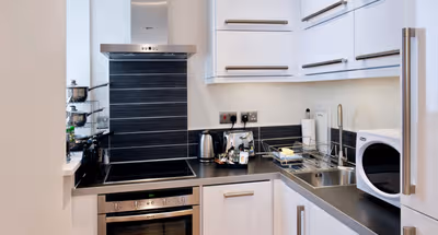Fully equipped kitchen in Studio apartment at Byron House Apartment Cambridge