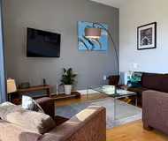 Spacious Living Area At The Hamilton's Penthouse 2 Bedroom 2 Bathroom