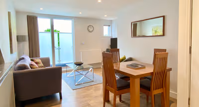 Living Area With Balcony at Jubilee House Duplex 2 Bedroom 2 Bathroom