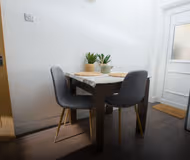 Fully equipped kitchen at Stunning 2 Bedroom Home | Free Parking and Wifi