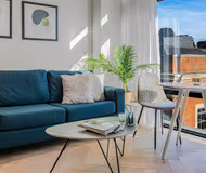 Dining space at Liverpool Street Apartments by MySquare