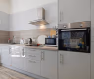 Fully equipped kitchen at 2 Sussex Place