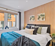 Luxury bedroom at 12 Tatler Close (Oak House)