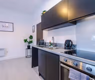 Fully equipped kitchen at Apex House Apartments