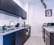 Fully equipped kitchen at Apex House Apartments