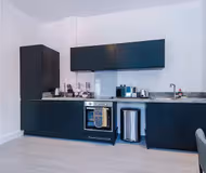 Fully equipped kitchen at Apex House Apartments