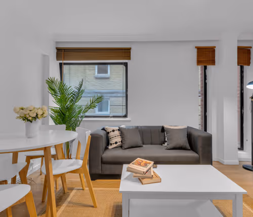 Living area at Mansion House Apartments by MySquare