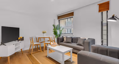 Bright living area at Mansion House Apartments by MySquare