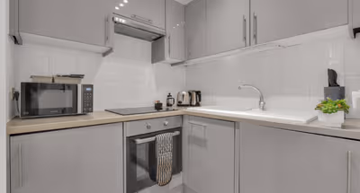 Fully equipped kitchen in 1 bed at Lena Extended Stays Residences by MySquare