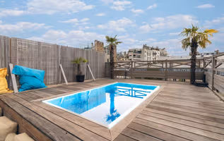 Stone's throw from the Eiffel Tower, the Seine with Rooftop hot tub & Private Movie Theatre