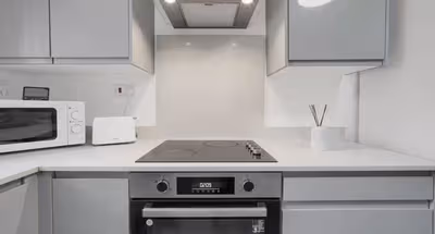 Modern 1BR Flat + Patio | Free Wifi & Amenities