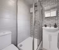 Modern 1BR Flat + Patio | Free Wifi & Amenities