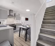 Modern 1BR Flat + Patio | Free Wifi & Amenities