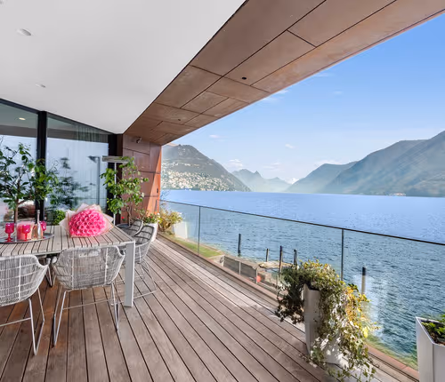Exclusive Lakefront Luxury Villa with Panoramic Views & Private Beach Access on Lake Lugano