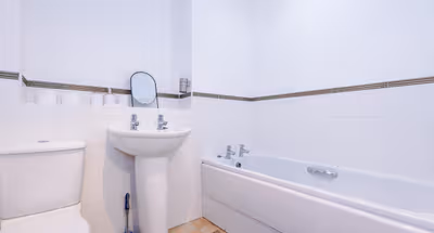 Fully furnished bathroom at Stylish 2-Bed Apartment in Altrincham | Free Parking | Sleeps 4