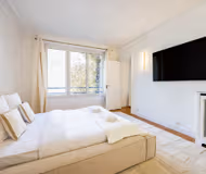 Elegant & Spacious 3-Bedroom Residence near Parc Monceau with Modern Comforts & Abundant Natural Light