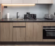 Fully equipped kitchen in Studio apartment at
Residence Inn Cork City