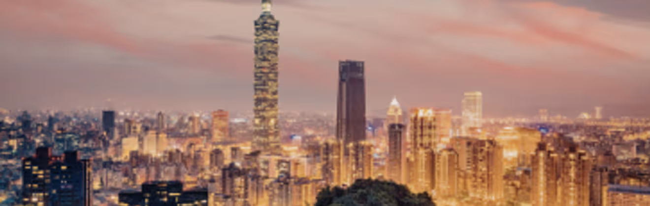 Taipei skyline at dusk featuring Taipei 101 tower