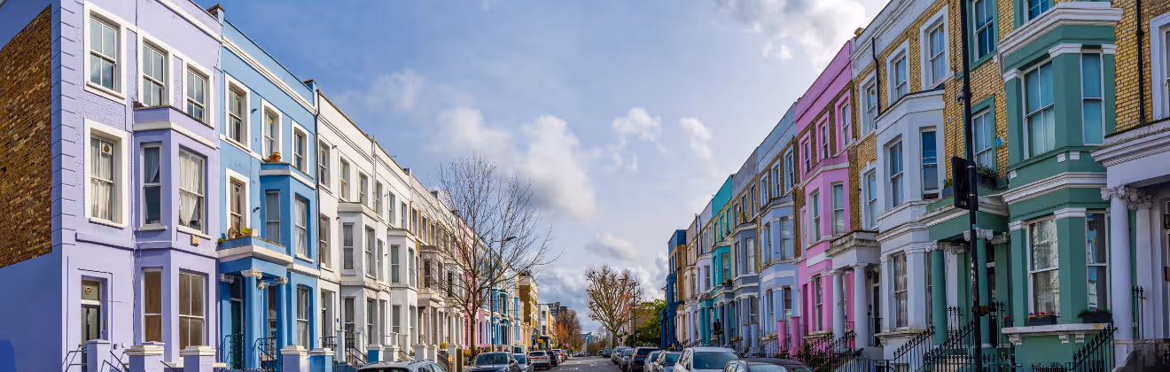 Colorful houses lining a street in Notting Hill, London